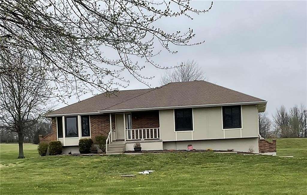 4.28 Acres of Land with Home for Sale in Peculiar, Missouri