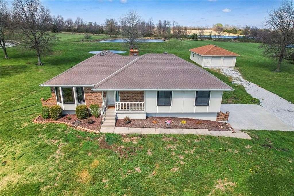 4.28 Acres of Land with Home for Sale in Peculiar, Missouri