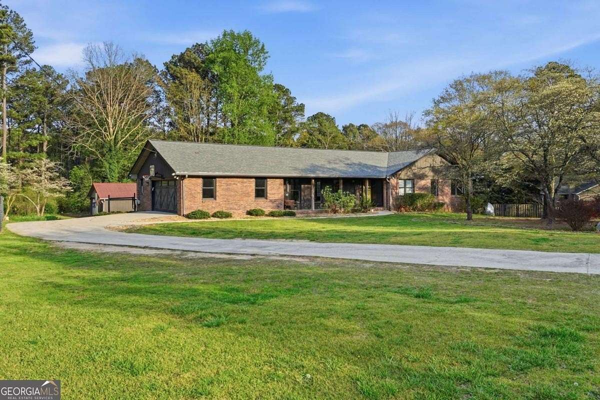 5 Acres of Land with Home for Sale in Grayson, Georgia
