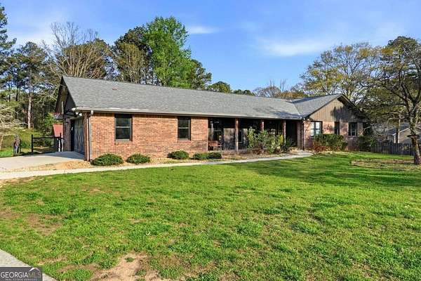 5 Acres of Land with Home for Sale in Grayson, Georgia
