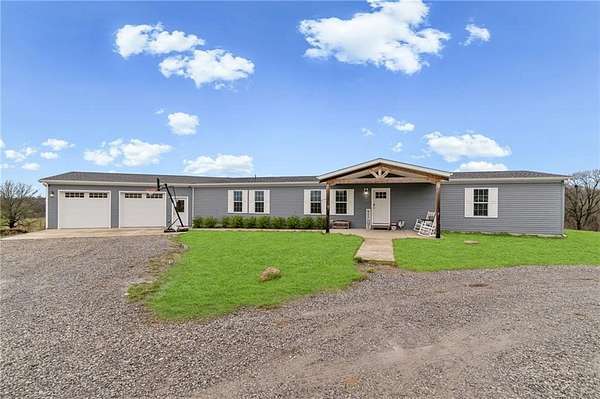 20 Acres of Agricultural Land with Home for Sale in Trimble, Missouri