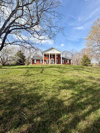 5.53 Acres of Land with Home for Sale in Central City, Kentucky