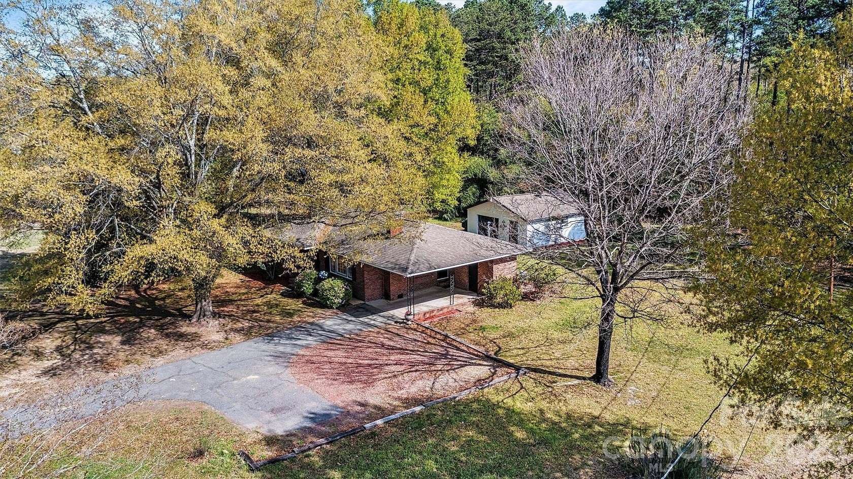 1.76 Acres of Land with Home for Sale in Iron Station, North Carolina