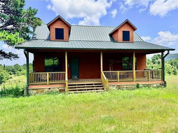 59 Acres of Recreational Land with Home for Sale in Howe, Oklahoma