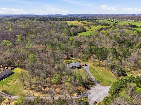 8.6 Acres of Land with Home for Sale in Cleveland, Tennessee