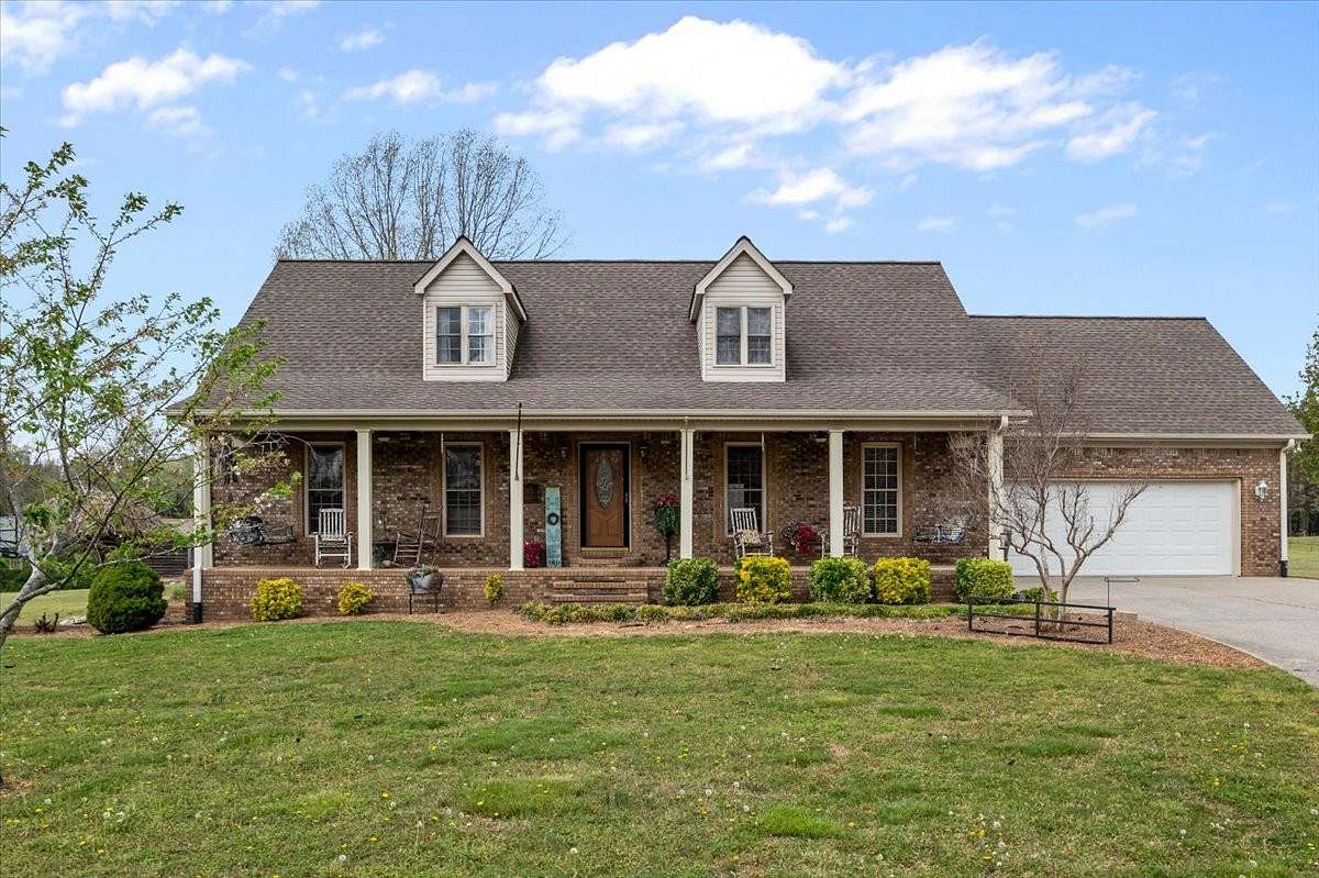 9.4 Acres of Land with Home for Sale in New Johnsonville, Tennessee