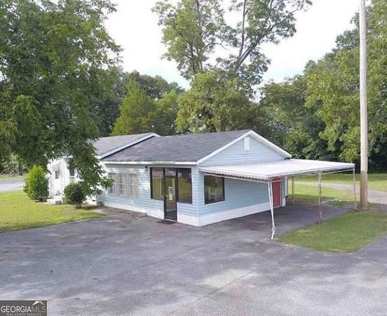 1.6 Acres of Improved Commercial Land for Sale in Woodbury, Georgia