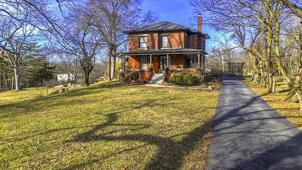 2.4 Acres of Land with Home for Sale in Moberly, Missouri