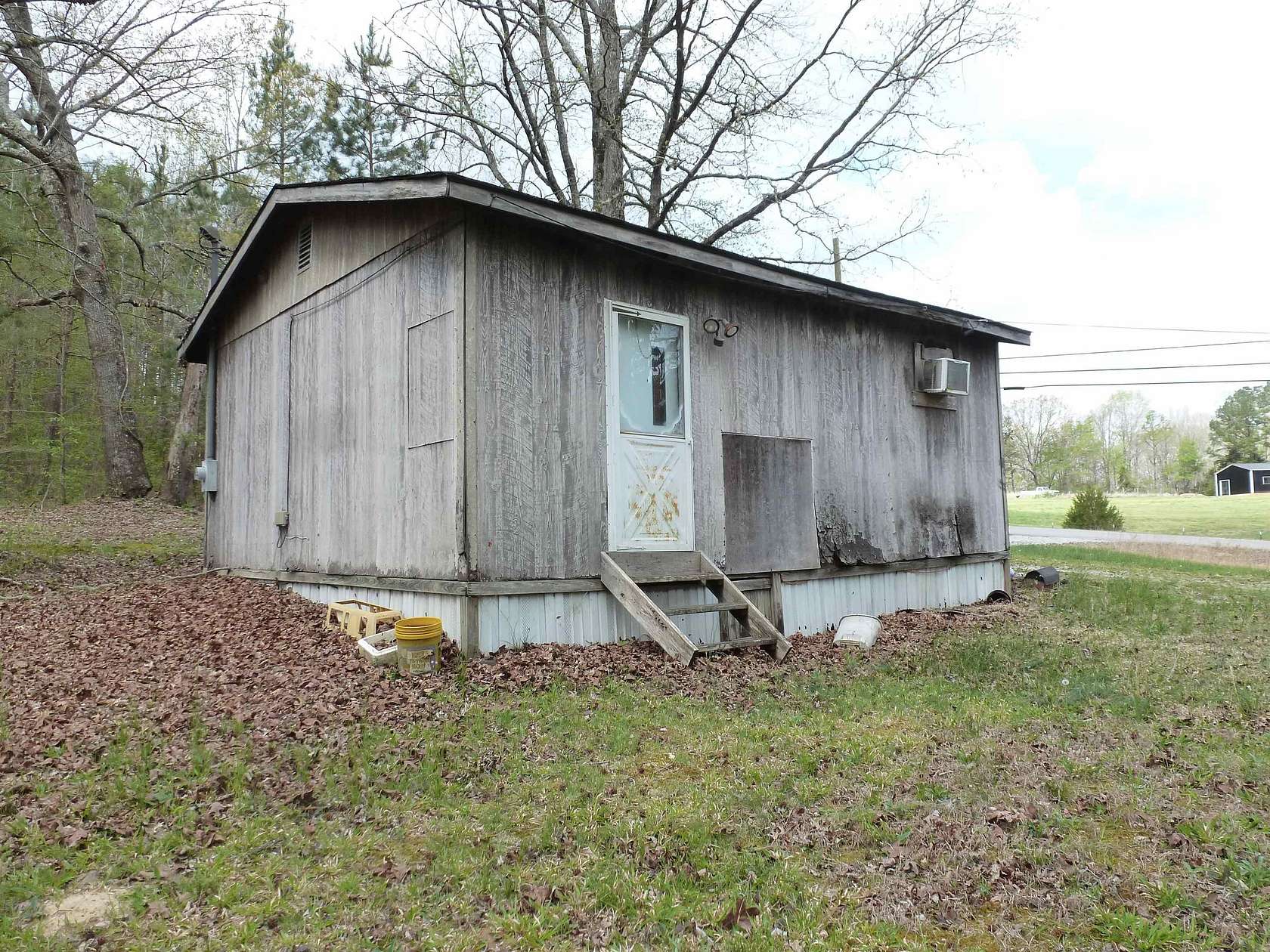 5.26 Acres of Land with Home for Sale in Russellville, Alabama