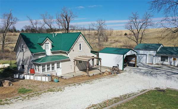 28.4 Acres of Land with Home for Sale in Lacona, Iowa