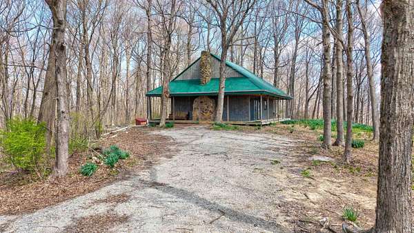16.6 Acres of Recreational Land with Home for Sale in Rome, Indiana