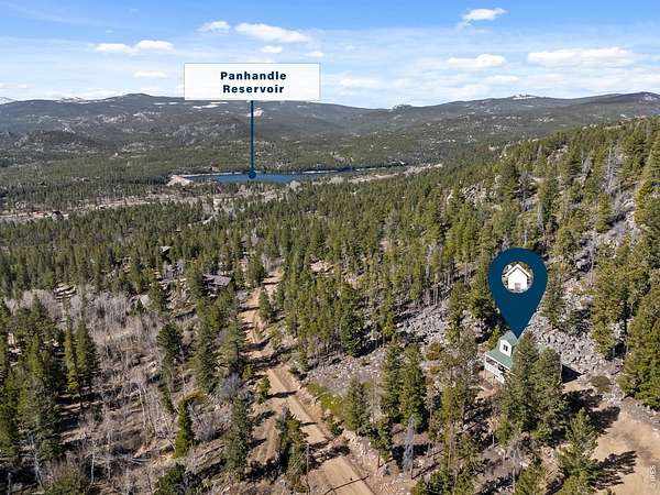 1.63 Acres of Land with Home for Sale in Red Feather Lakes, Colorado