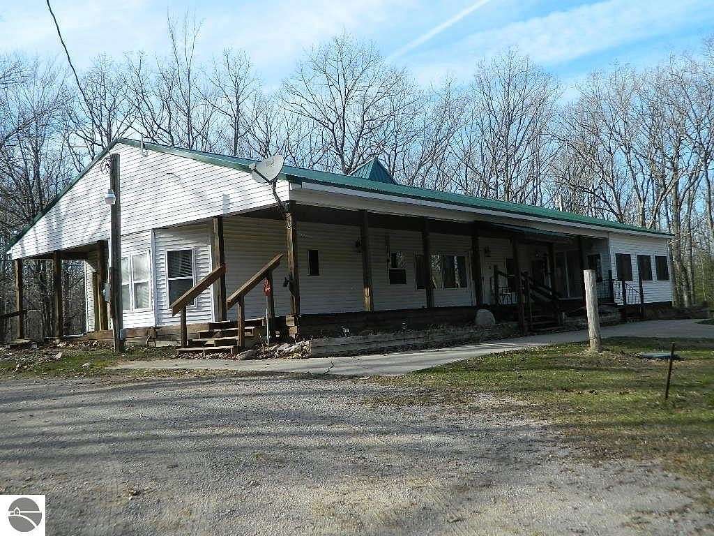 29.5 Acres of Recreational Land with Home for Sale in Harrison, Michigan