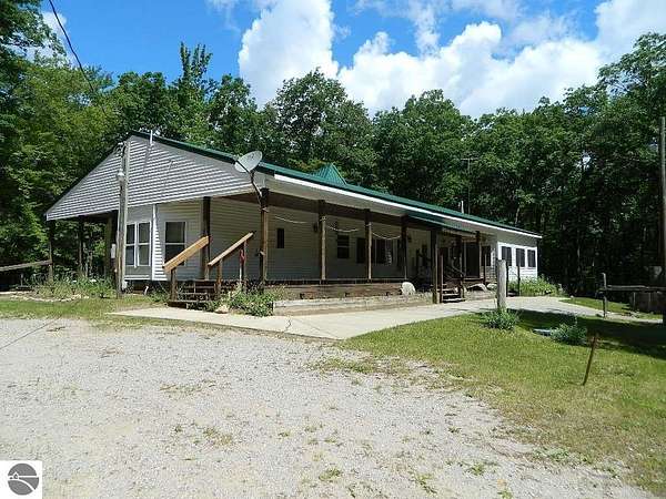 29.5 Acres of Land with Home for Sale in Harrison, Michigan