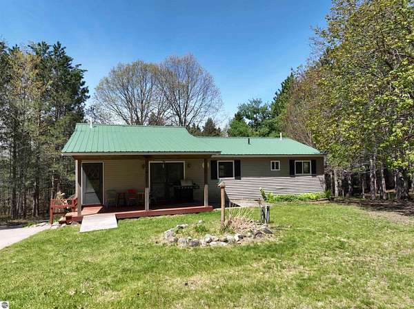 10 Acres of Recreational Land with Home for Sale in Fife Lake, Michigan