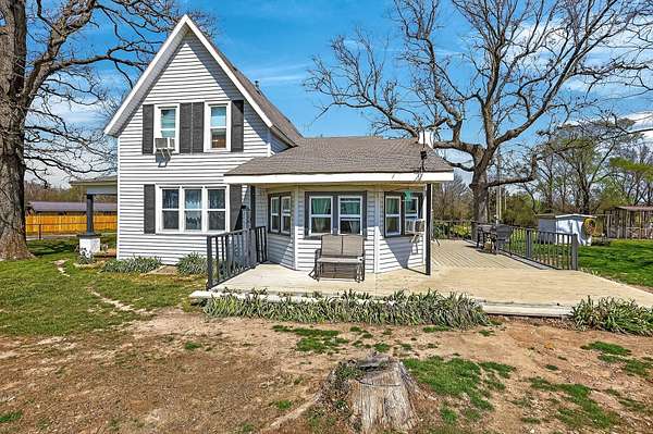 4.85 Acres of Land with Home for Sale in Pleasant Hope, Missouri