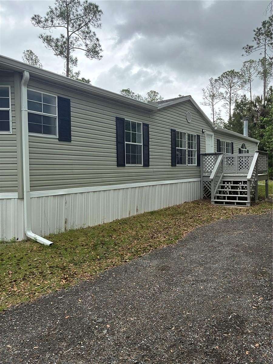 2 Acres of Land with Home for Sale in Bunnell, Florida