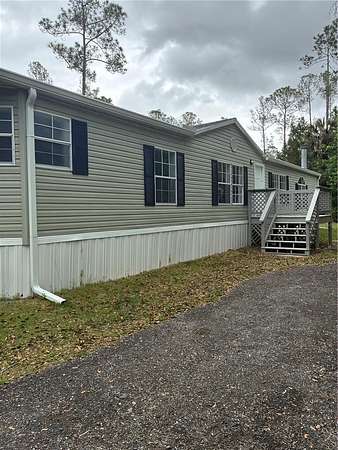 2 Acres of Land with Home for Sale in Bunnell, Florida