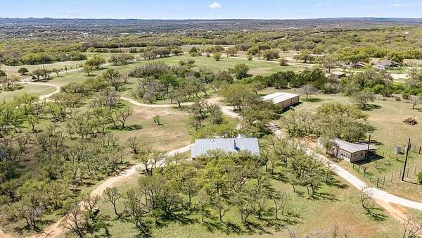 11 Acres of Recreational Land with Home for Sale in Johnson City, Texas