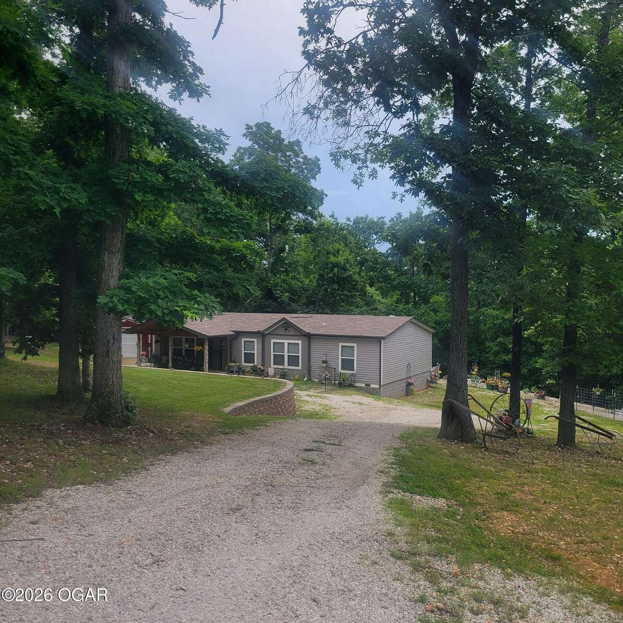 40.2 Acres of Land with Home for Sale in Stella, Missouri
