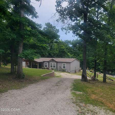 40.2 Acres of Land with Home for Sale in Stella, Missouri