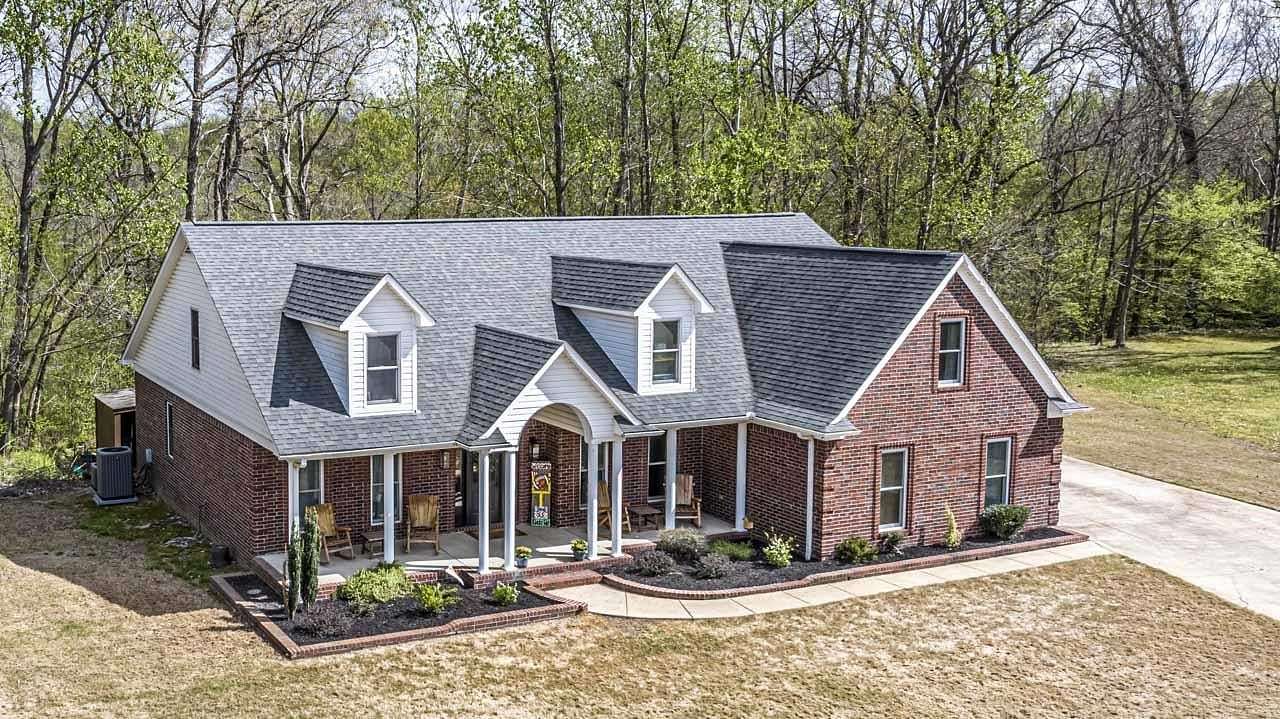 2.5 Acres of Land with Home for Sale in Drummonds, Tennessee