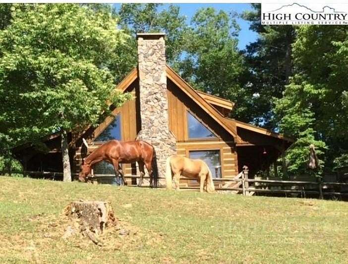 11.2 Acres of Land with Home for Sale in Ferguson, North Carolina