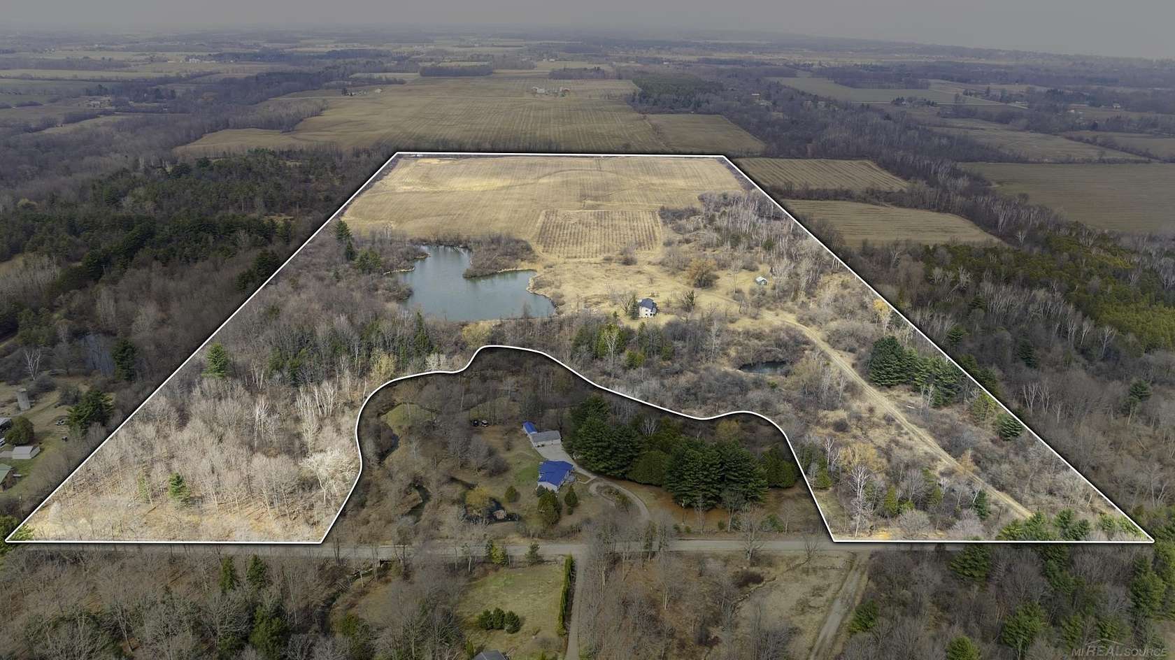 74.9 Acres of Land with Home for Sale in Lexington, Michigan
