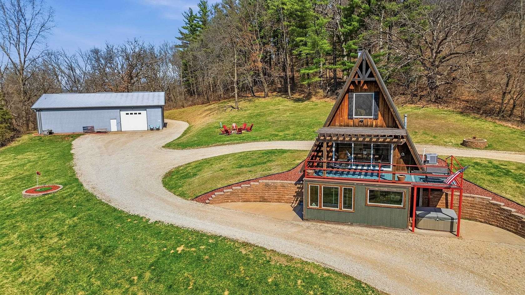 55 Acres of Recreational Land with Home for Sale in Peosta, Iowa