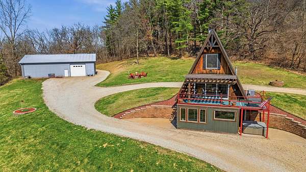 55 Acres of Recreational Land with Home for Sale in Peosta, Iowa