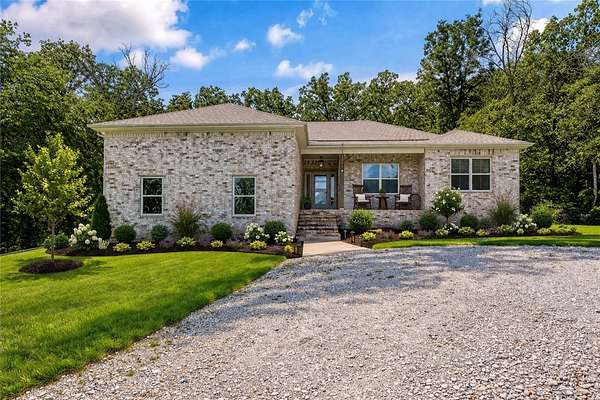 6.85 Acres of Land with Home for Sale in Elkins, Arkansas