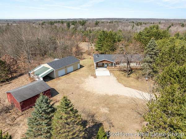 19.5 Acres of Recreational Land with Home for Sale in Morley, Michigan
