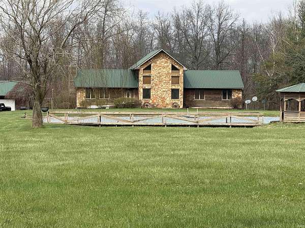 6.35 Acres of Land with Home for Sale in Hartford City, Indiana