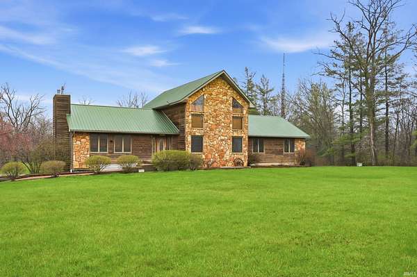 6.35 Acres of Land with Home for Sale in Hartford City, Indiana