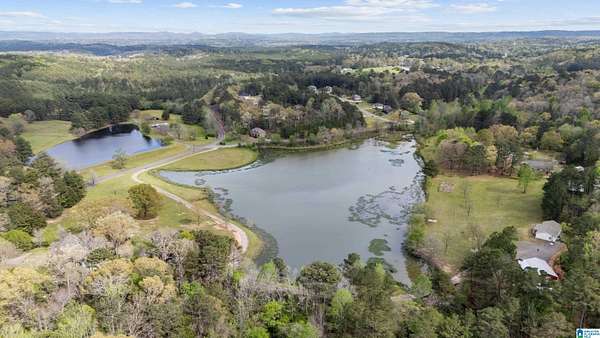 15.7 Acres of Land with Home for Sale in Morris, Alabama