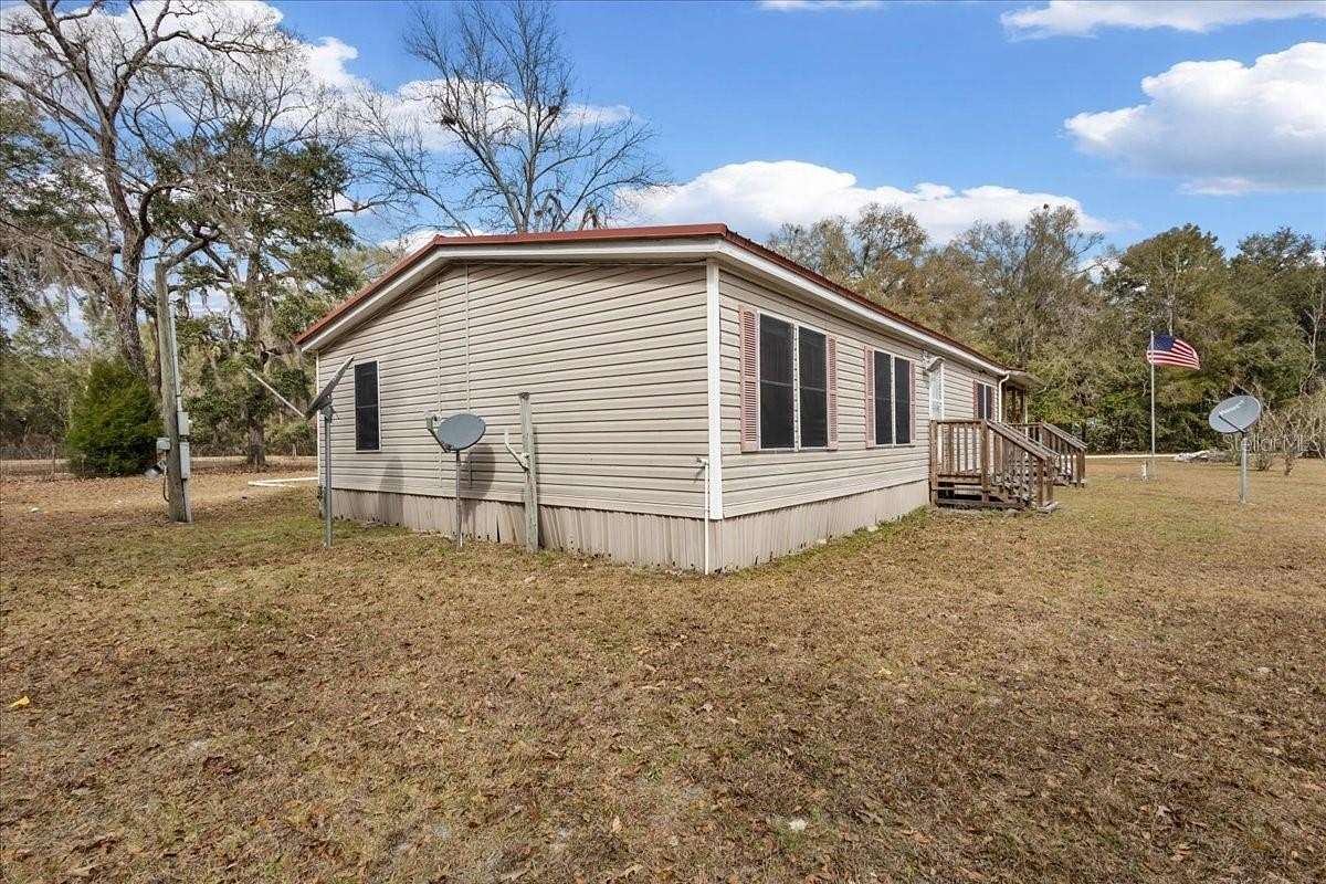 5 Acres of Land with Home for Sale in Chiefland, Florida