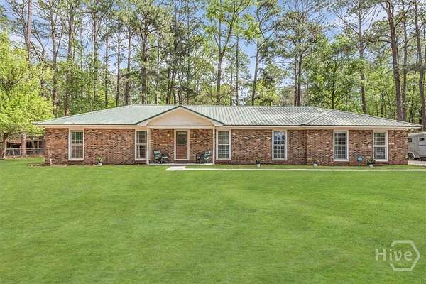 6.8 Acres of Land with Home for Sale in Fleming, Georgia