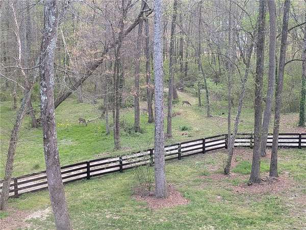 9.76 Acres of Land with Home for Sale in Lawrenceville, Georgia