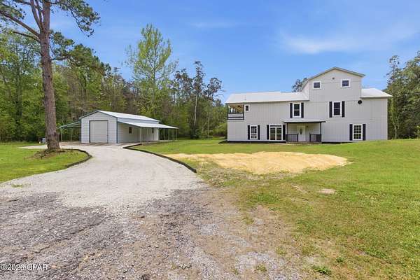 20.8 Acres of Land with Home for Sale in Bonifay, Florida