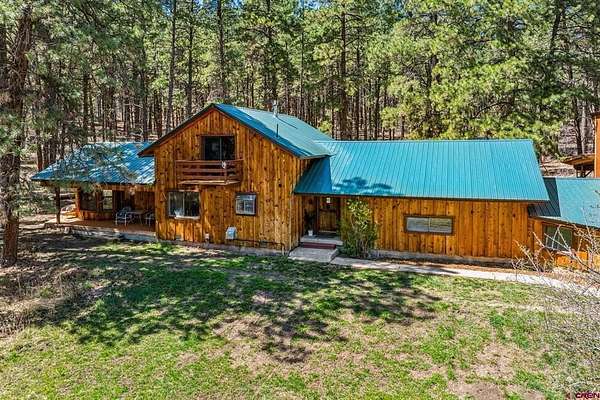 64.8 Acres of Recreational Land with Home for Sale in Bayfield, Colorado
