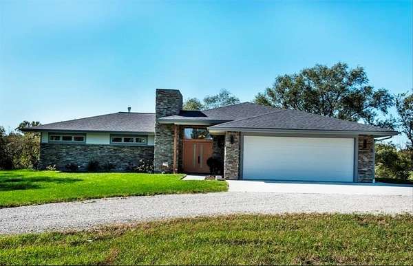 20 Acres of Agricultural Land with Home for Sale in Baldwin City, Kansas