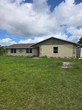 2.36 Acres of Land with Home for Sale in Kissimmee, Florida