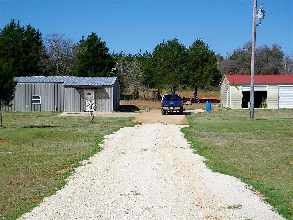 24.9 Acres of Recreational Land with Home for Sale in Coyle, Oklahoma