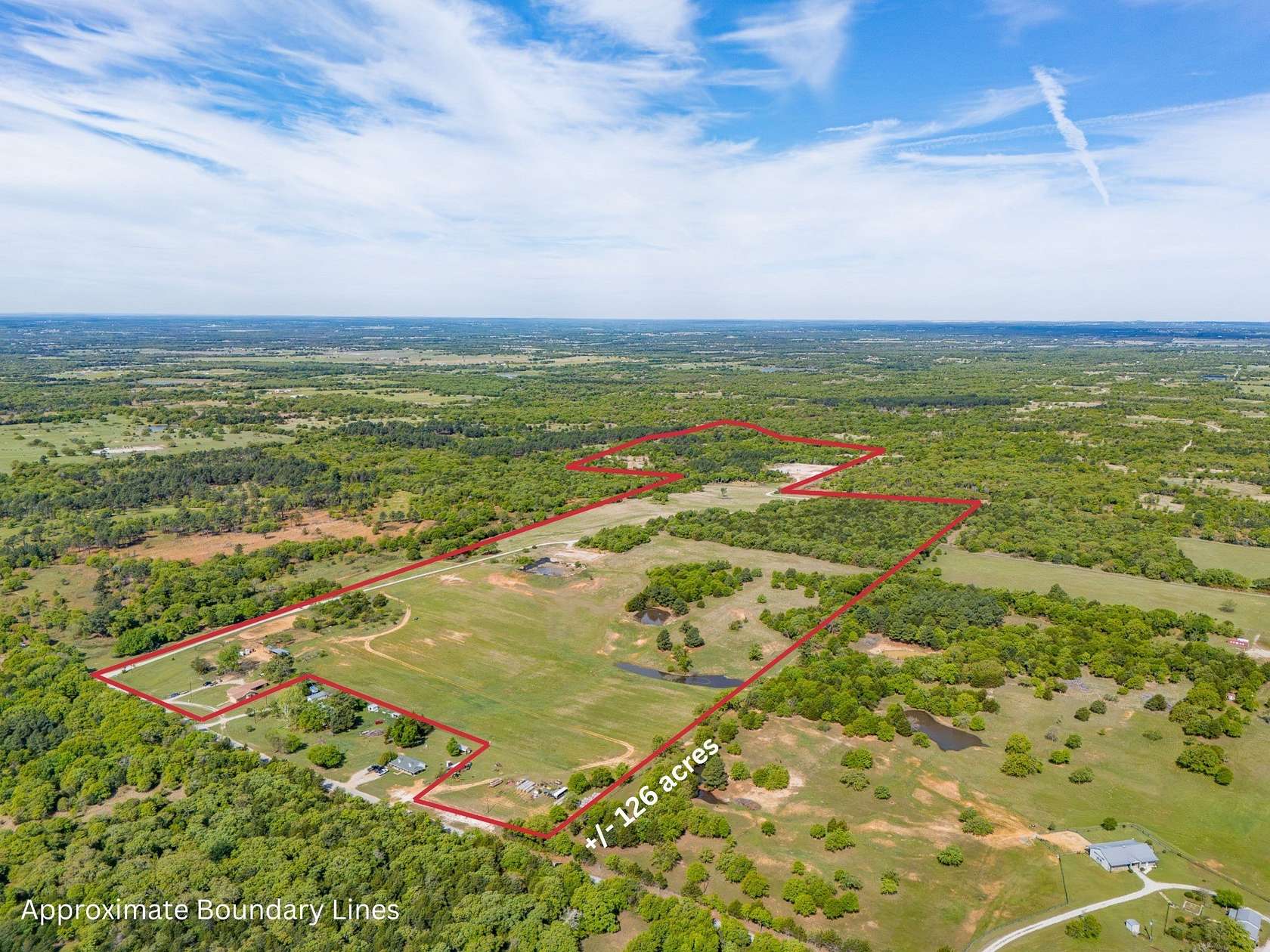 126 Acres of Land with Home for Sale in Alvord, Texas