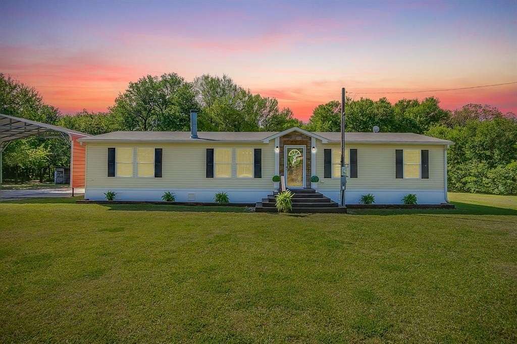 2.29 Acres of Land with Home for Sale in Grandview, Texas