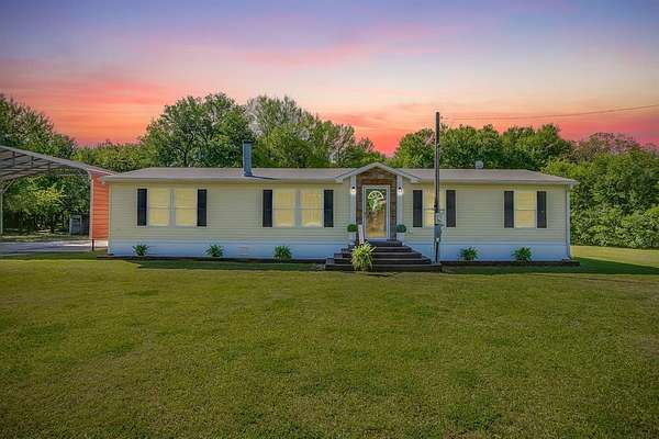 2.29 Acres of Land with Home for Sale in Grandview, Texas