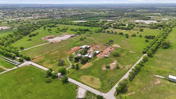 40.7 Acres of Agricultural Land with Home for Sale in Justin, Texas