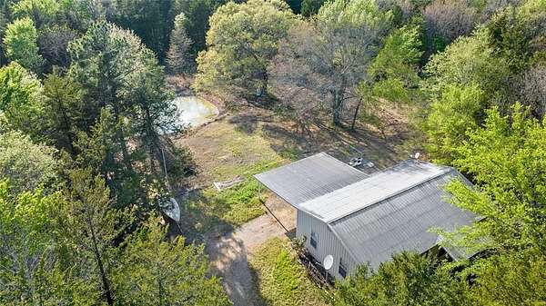 14.7 Acres of Recreational Land with Home for Sale in Paris, Texas