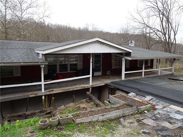 2 Acres of Land with Home for Sale in Ruffs Dale, Pennsylvania