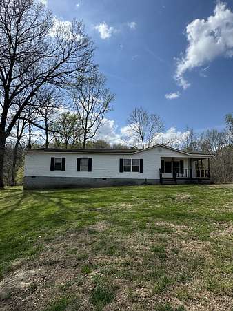 5.24 Acres of Land with Home for Auction in Lebanon, Tennessee